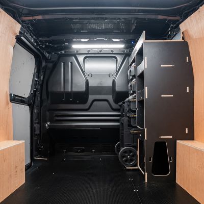Rear van view of the Kia PV5 Cargo DeWalt ToughSystem Trolley Compatible Van Racking - Front displayed with DeWalt ToughSystem toolboxes, trolley and top tray