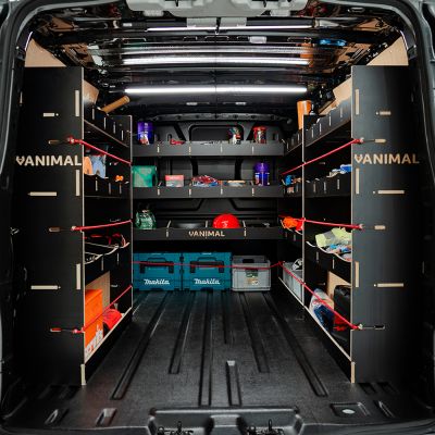 Rear van view of the Ford Transit Custom SWB 2023-2023 Hexaboard Complete Full Van Racking Solution displaying equipment, tools and boxes 