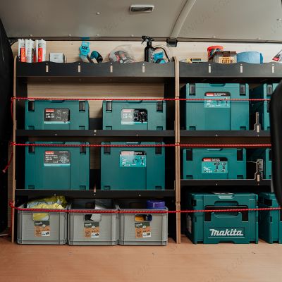 Side van side angle view of the Fiat Scudo LWB Hexaboard Driver Side MakPac/Toolbox Van Racking displayed with Makita and Euro toolboxes