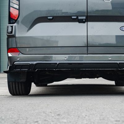 Close-up front view of the Transit Custom 2023- Gloss Black Rear Diffuser
