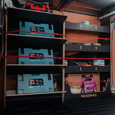 Nissan Townstar 2022 L2 driver side racking system with angled toolbox shelves and rear compartments