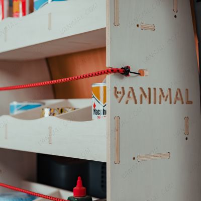 Close-up side panel view of the Vanimal branding