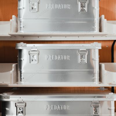 Close-up front view of the Transit Custom 2023- Front Predator Storage Box (x3) Ply Racking System