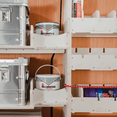 Close-up view of the seamless fit of the Transit Custom 2023- LWB Adjustable Driver Side Racking + 3 Predator Storage Boxes