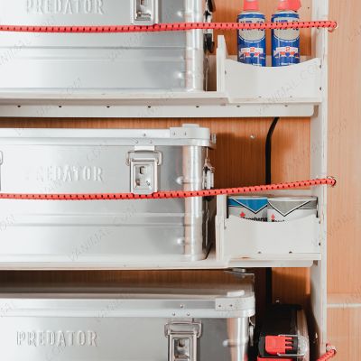 Transit Custom 2023- Predator Storage Box (x3) Racking System - close-up view of the side storage fitted with bungee cords