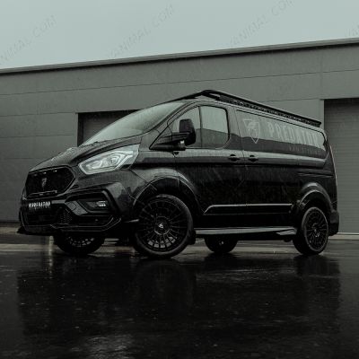 Side angle view of the Ford Transit Custom fitted to 18" Iconic Alloys