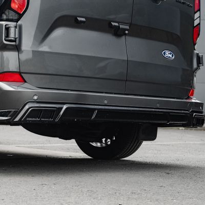 Close-up side angle view of the Transit Custom 2023- Gloss Black Rear Diffuser