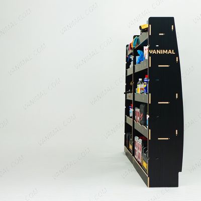 Rear van view of the Nissan Interstar 2025- Hexaboard Driver Side Van Racking (Multi-Compartment) displayed with tools and toolboxes