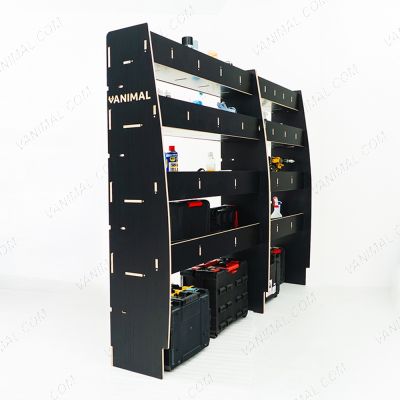 Back view of the Nissan Interstar 2025- Hexaboard Driver Side Van Racking (Multi-Compartment) displayed with tools and toolboxes