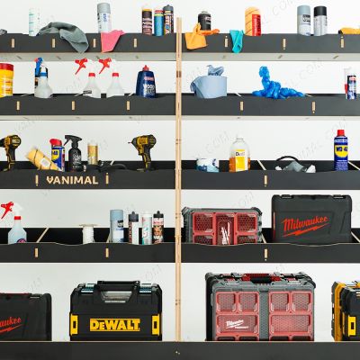 Close-up front view of the racking compartments displayed with tools and equipment 