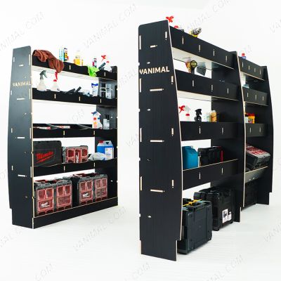 RH side angle view of the MAN TGE 2017- MWB Hexaboard Triple Van Racking with Toolbox Shelf displayed with tools and toolboxes