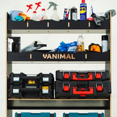 Close-up front view of the racking compartments and shelves displayed with tools and toolboxes 