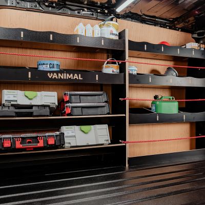 Side angle view of the Fiat Scudo SWB Hexaboard Triple Racking System with x2 Toolbox Shelves