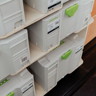 Close-up view of the two bottom Festool Systainer Shelving Unit - displayed with boxes