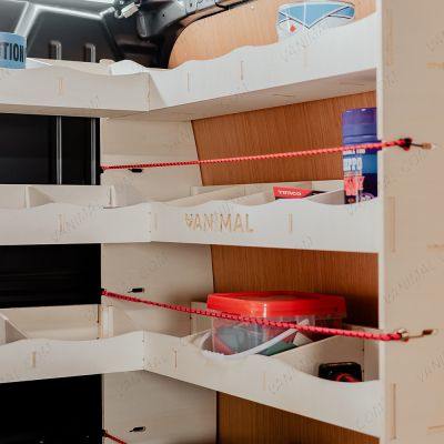 Close-up view of the Fiat Scudo Bulkhead and Front L-Shape Racking compartments displayed with equipment