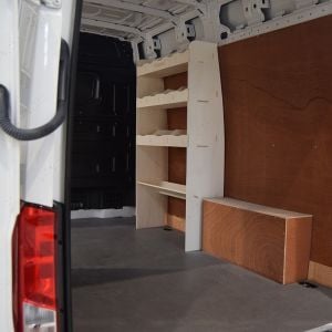 Side angle view of the VW Crafter 2006- MWB Front Ply Racking with Toolbox Shelf