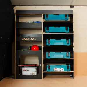 Side van view of the VW Transporter T7 Hexaboard Front Ulti-Rack Van Racking V2 displaying Makita equipment, tools and boxes
