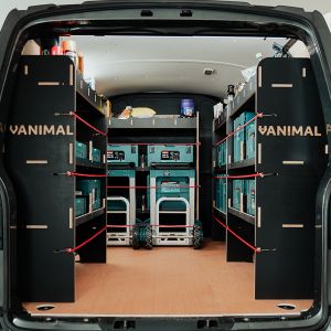 Rear van view of the Renault Trafic 2014- LWB Hexaboard MakPac/Toolbox Full Van Racking (4-Pack) displaying equipment, tools and boxes