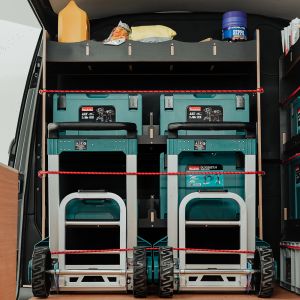 Rear van view of the VW Transporter T7 Hexaboard Bulkhead MakPac/Toolbox Shelves & Compartments displaying equipment, tools and boxes