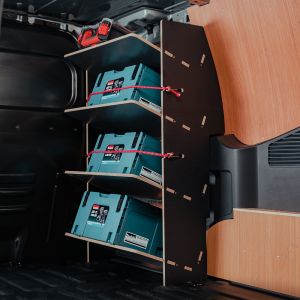 Side angle view of the Ford Transit Courier 2024- Hexaboard Front Toolbox Van Racking with x4 Shelves - displaying makita & milwaukee tools