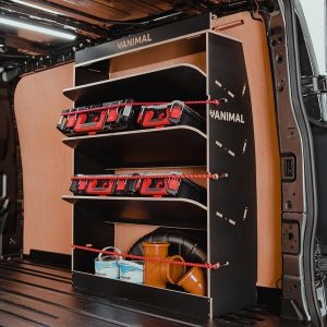 Rear side angle view of the Ford Transit Custom 2023- SWB Milwaukee PackOut Black Hexaboard Rear Racking