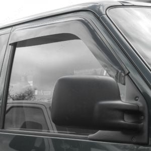 Close-up view of the VW Transporter T4 fitted with adhesive wind deflectors