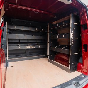 OS rear van side angle view of the VW Caddy Cargo 2021- OS Rear and Full-Width Bulkhead Hexaboard Van Racking
