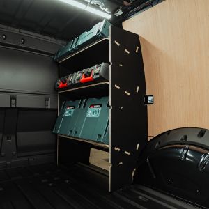Rear van side angle view of the Ford Transit Connect LWB 2024- OS Front Hexaboard Toolbox Van Racking displayed with makita and milwaukee tools
