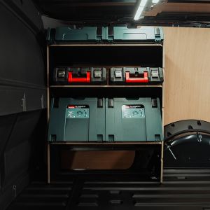 Side van view of the VW Caddy Cargo Maxi 2021- OS Front Hexaboard Toolbox Van Racking displayed with makita and milwaukee tools