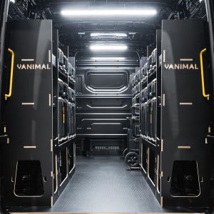 Rear van view of the VW Crafter 2017+ DeWalt ToughSystem 2.0 Trolley Compatible Van Racking (x3 V1) displayed with DeWalt ToughSystem 2.0 toolboxes and trolley