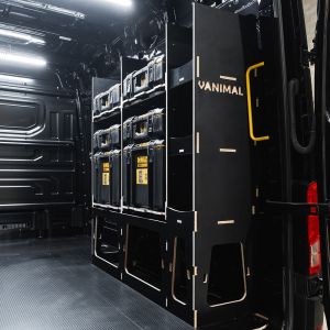 Rear van side angle view of the VW Crafter 2017+ DeWalt ToughSystem 2.0 Toolbox Compatible Van Racking - OS Rear displayed with DeWalt ToughSystem 2.0 toolboxes