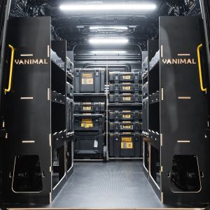 Rear van view of the VW Crafter 2017+ DeWalt ToughSystem 2.0 Trolley Compatible Van Racking (x3 V4) displayed with DeWalt ToughSystem 2.0 toolboxes and trolley