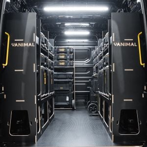 Rear van view of the VW Crafter 2017+ DeWalt ToughSystem 2.0 Trolley Compatible Van Racking (x4 V1) displayed with DeWalt ToughSystem 2.0 toolboxes and trolleys