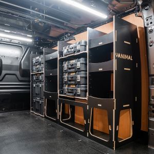 Rear van side angle view of the Ford Transit Custom 2012-2023 L1 DeWalt TSTAK Toolbox Compatible Van Racking (Full OS) displayed with DeWalt TSTAK toolboxes