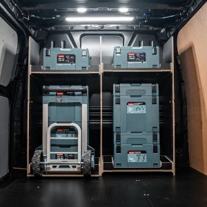 Rear van view of the Ford Transit Custom 2012-2023 Makita Makpac Trolley Compatible Van Racking - Full-Width Bulkhead displayed with Makita Makpac toolboxes and trolley