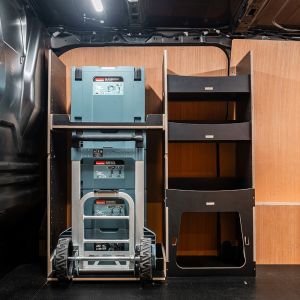 Side van view of the Ford Transit Custom 2012-2023 Makita Makpac Trolley Compatible Van Racking - Front displayed with Makita Makpac toolboxes and trolley