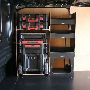 Side van view of the Kia PV5 Cargo Milwaukee Packout Trolley Compatible Van Racking - Front displayed with Milwaukee toolboxes and trolley