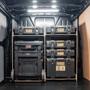 Rear van view of the Ford Transit Custom 2012-2023 DeWalt ToughSystem 2.0 Trolley Compatible Van Racking - Full-Width Bulkhead displayed with DeWalt ToughSystem 2.0 toolboxes and trolley