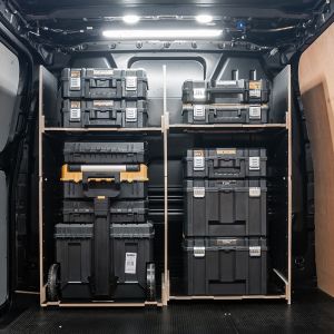 Rear van view of the Ford Transit Custom 2012-2023 DeWalt TSTAK Trolley Compatible Van Racking - Bulkhead displayed with DeWalt TSTAK trolley and toolboxes