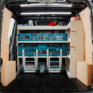 Rear van view of the Ford Transit Custom 2012-2023 Front & Bulkhead Makita MakPac Van Racking displaying equipment, tools and boxes