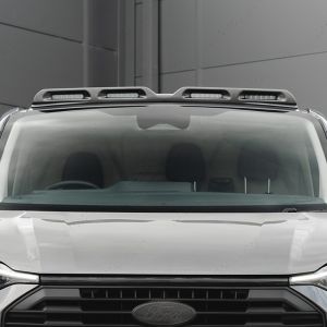 Close-up front van view of the VW Transporter T7 Lazer Lights LED Roof Light Integration in Black
