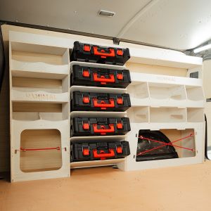 Side van angle view of the Ford Transit Custom 2023- Driver Side Ulti-Rack Van Racking V4 displaying Milwaukee boxes
