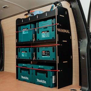 OS side view of the VW Transporter T7 SWB Hexaboard OS Rear MakPac/Toolbox Shelves & Compartments displaying equipment, tools and boxes