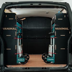 Rear van view of the Vauxhall Vivaro C 2019+ LWB  Hexaboard Double Rear MakPac/Toolbox Van Racking (Pair) displaying equipment, tools, and boxes.