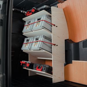 Side angle view of the Ford Transit Courier 2024- Front Toolbox Van Racking with x4 Shelves