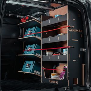 Side angle view of the Transit Courier 2024- Hexaboard Driver Side Van Racking with x4 Toolbox Shelves
