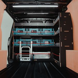 Rear van view of the Transit Custom 2023- Hexaboard Front & Bulkhead Makita MakPac Van Racking displaying equipment, tools and boxes