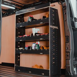 Rear van side angle view of the Ford Transit Custom LWB 2023- OS Rear Adjustable Compartment Hexaboard Van Racking