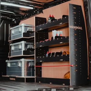 Side angle view of the VW Transporter T7 SWB Hexaboard Adjustable Driver Side Racking + 3 Predator Storage Boxes