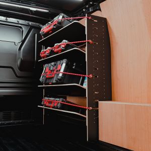 Side angle view of the VW Transporter T7 Hexaboard Adjustable Front Toolbox Shelving Rack